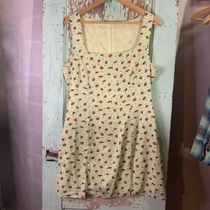 Women’s green dress with a fruit pattern